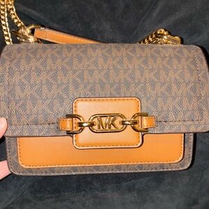 Elevate your style with this classy, Michael Kors bag